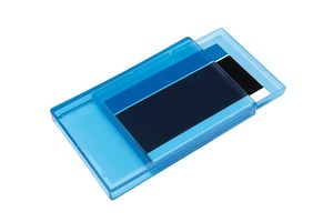 Business card holder &quot;Invite&quot; with a sliding lid, clip mechanism and a frosted bottom