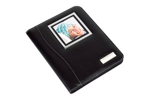 Conference file &quot;Aristo&quot; in a DIN A4 format with a turnable frame (one side with a calculator and the other for a photo)